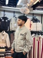 Cream bomber jacket