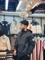 Black hooded tactical windbreaker jacket